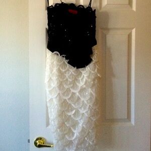 Black and white strapless sequin knee length gown